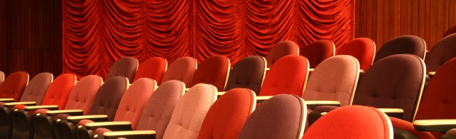 Row of seats in an empty theater