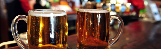 Two cups of beer in bar