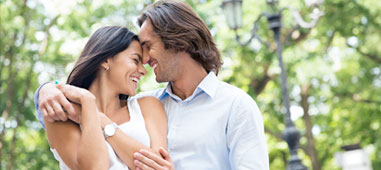 Couple smiling together on a city trip